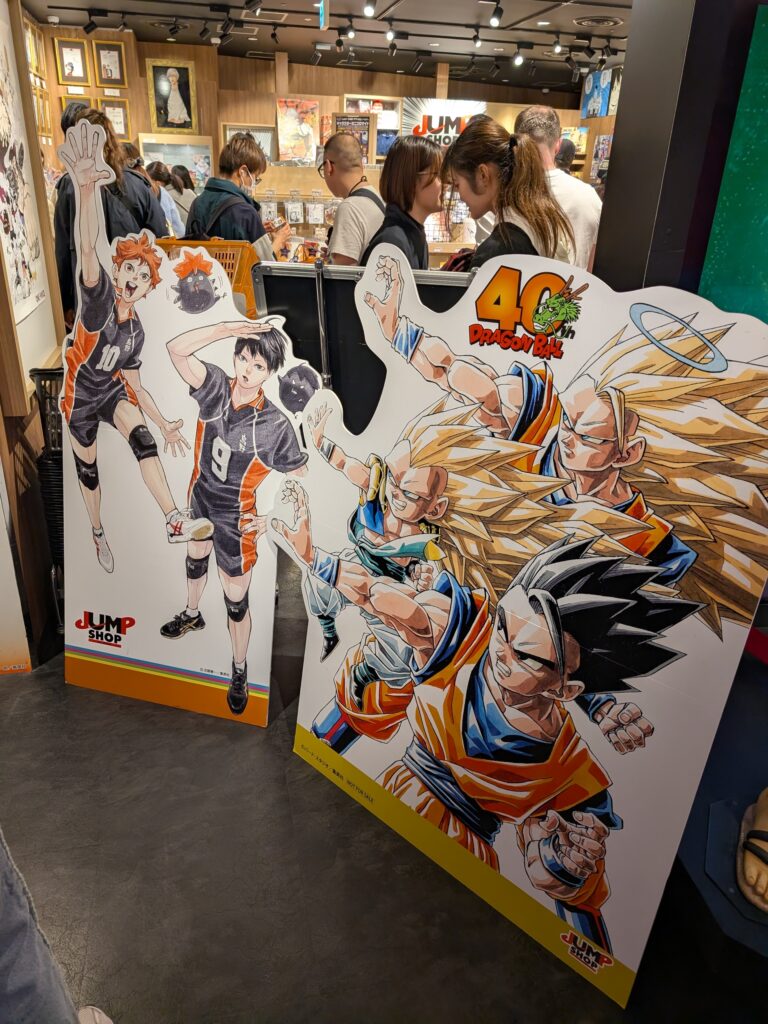 Anime posters at the entrance of a store