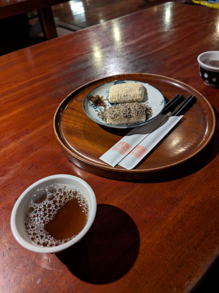 got tea and sweet powdered mochi